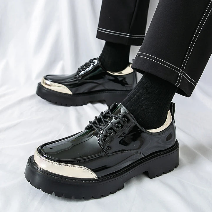 Black patent Oxford shoes with gold toe cap, side view