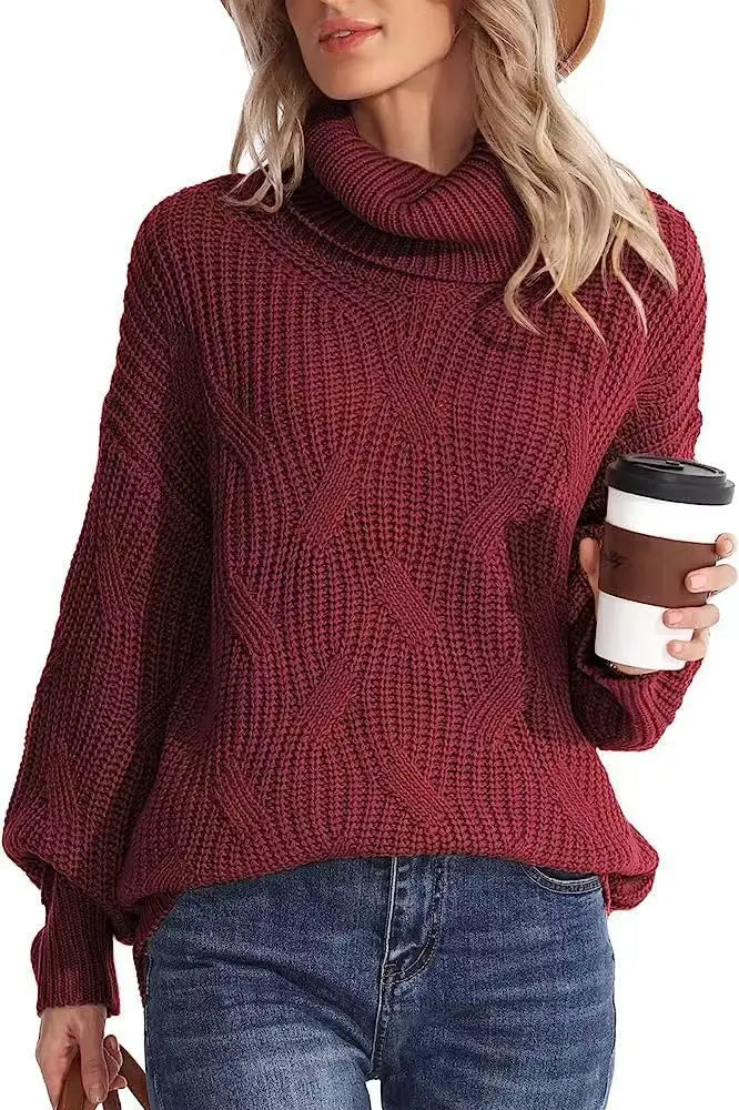 Woman wearing burgundy cable knit oversized turtleneck sweater