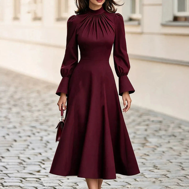 Burgundy mock neck midi dress with flared cuff sleeves, front view