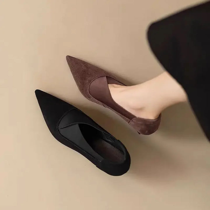 Dark brown and black pointed toe kitten heel pumps side by side