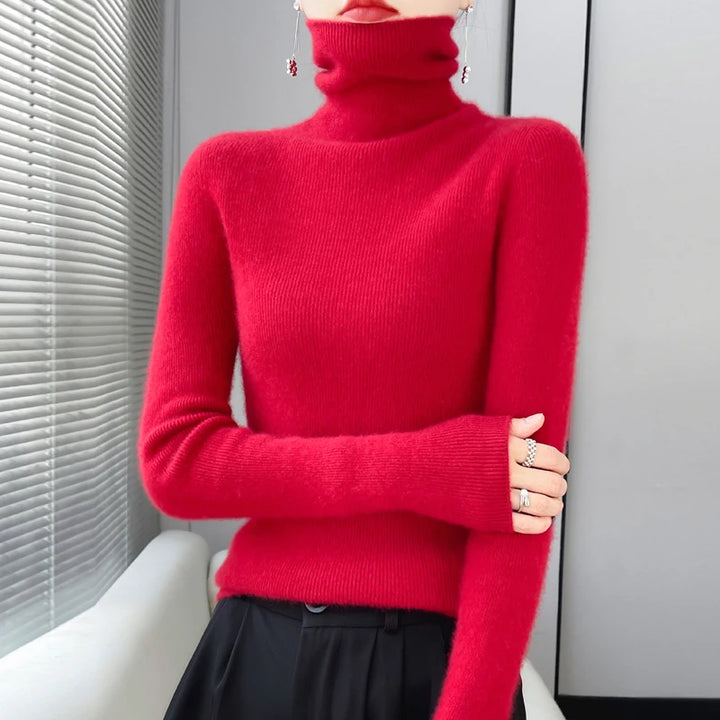Woman wearing red ribbed turtleneck sweater