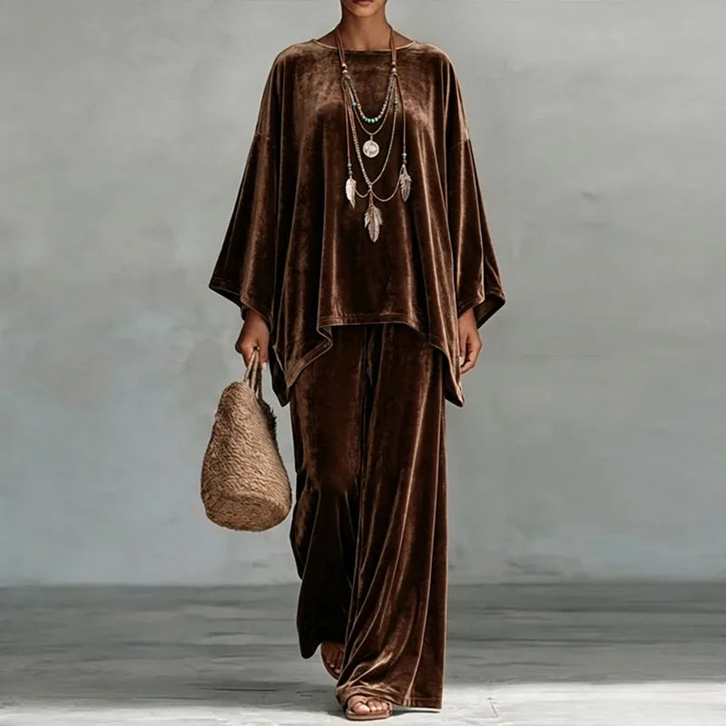 Woman wearing brown velvet batwing top and wide leg pants set, front view