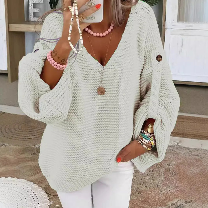 White chunky knit V-neck sweater with lantern sleeves