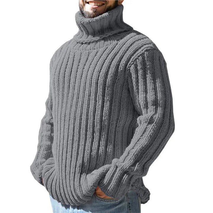 Man wearing gray ribbed turtleneck sweater