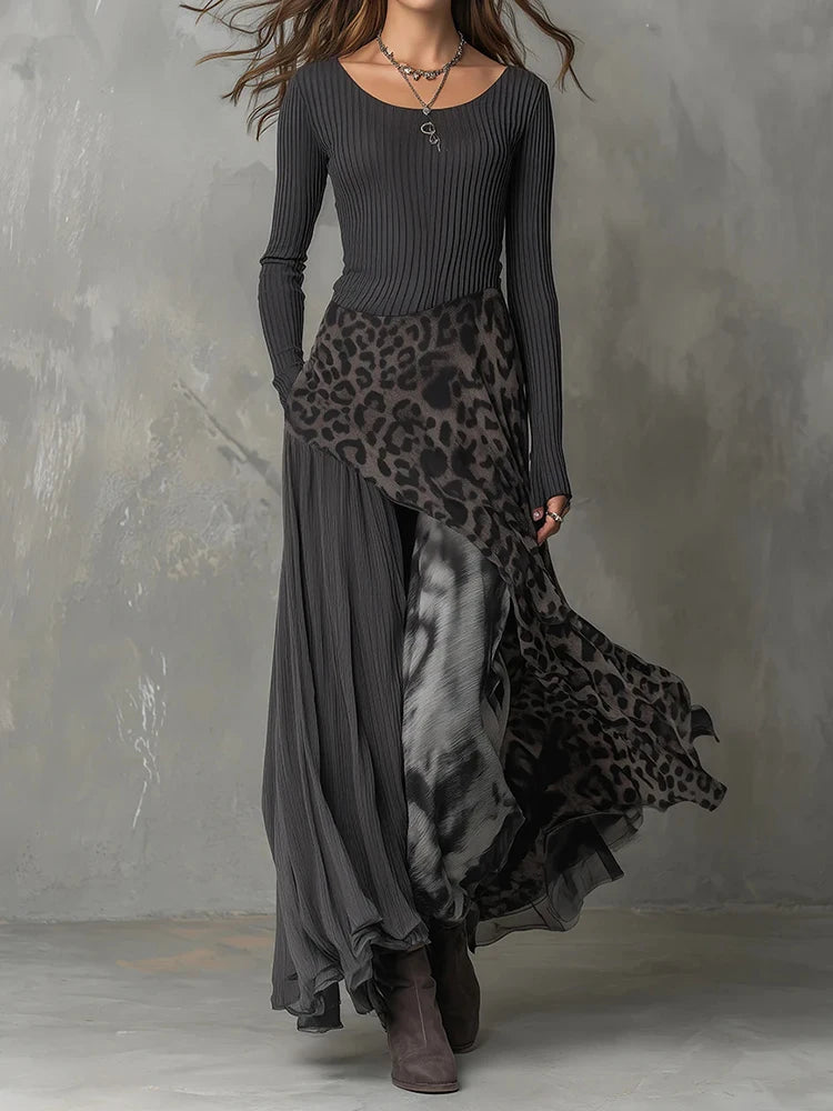 Woman wearing gray ribbed maxi dress with leopard print patchwork skirt, front view