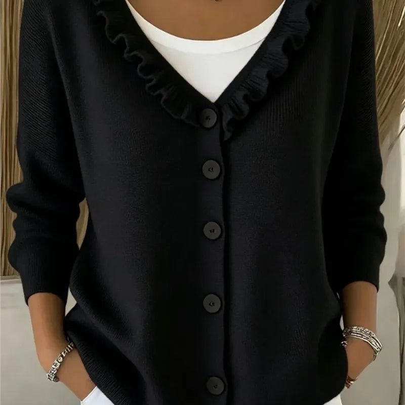 Black ruffle V-neck button front cardigan on model