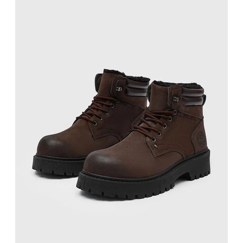 Pair of brown lace-up boots with lug soles