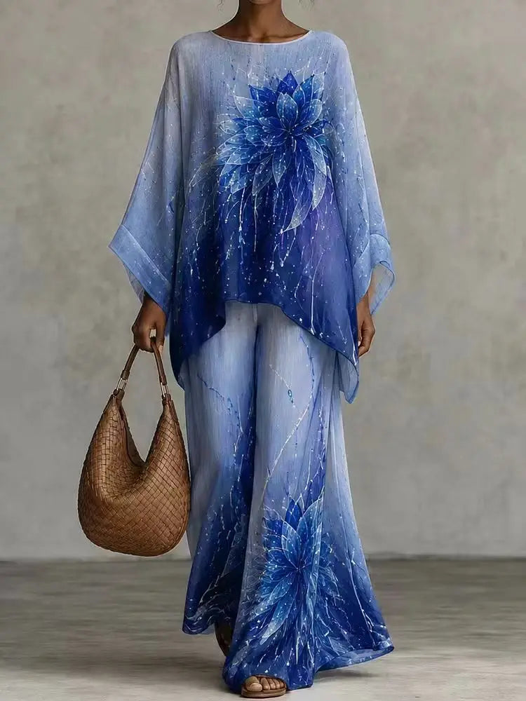 Woman wearing blue floral print batwing sleeve top and pants set