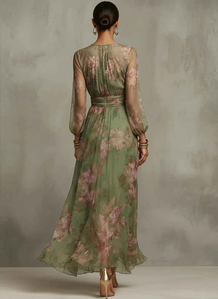 Back view of green floral maxi dress showing ruched waist tie