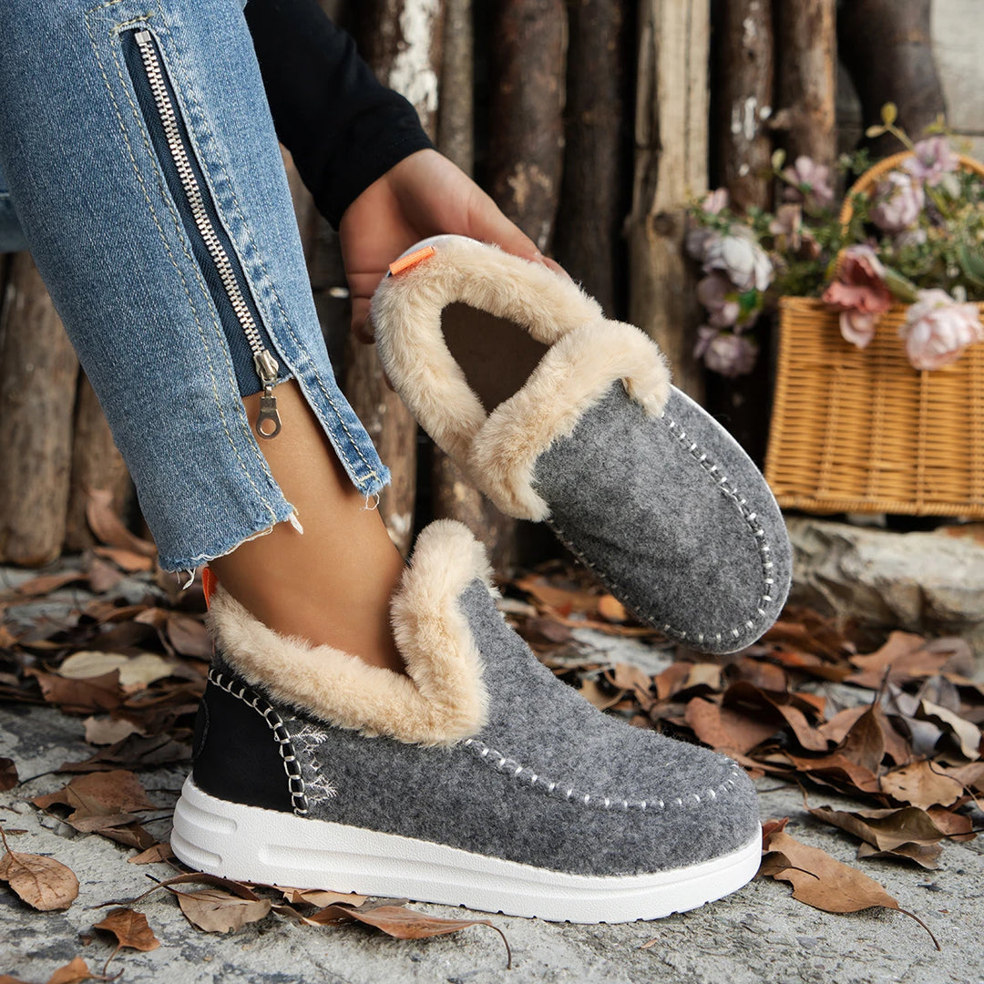 Gray felt ankle boots with faux fur trim and black heel panel