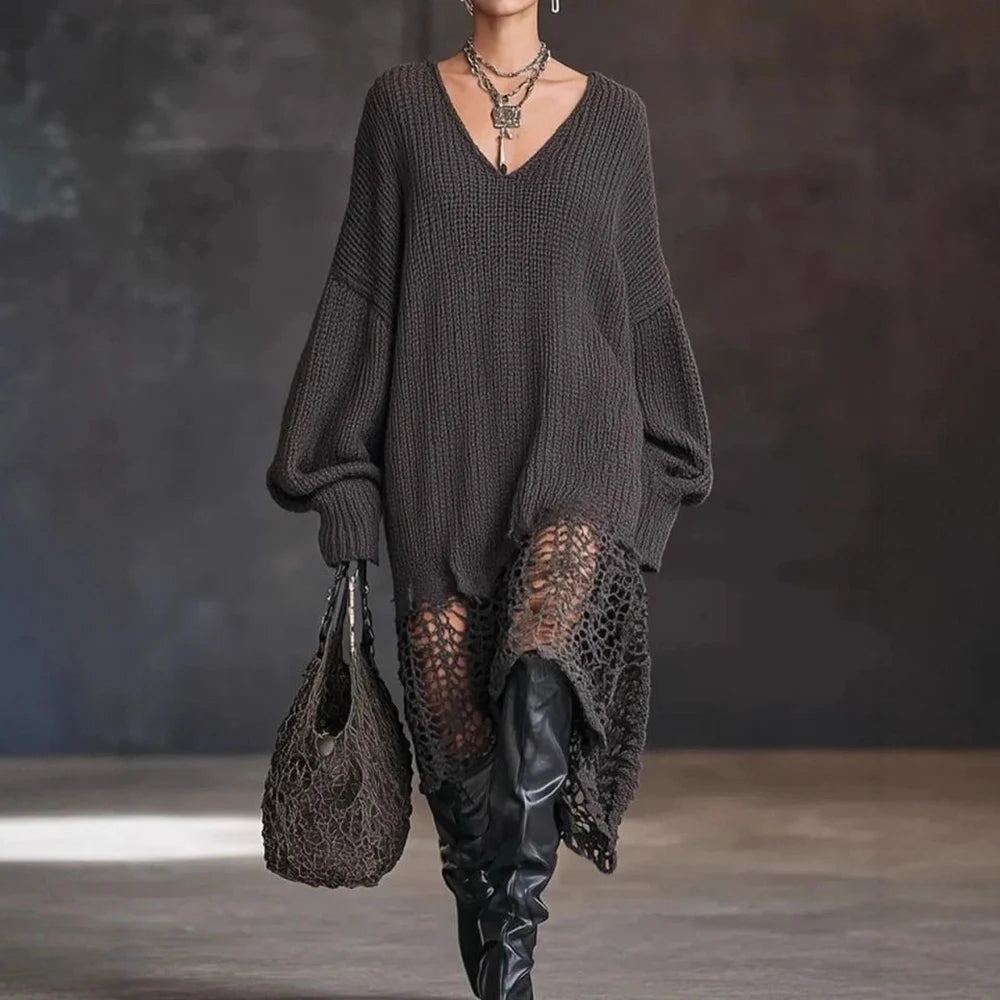 Model in dark gray oversized crochet-hem sweater dress with over-the-knee boots