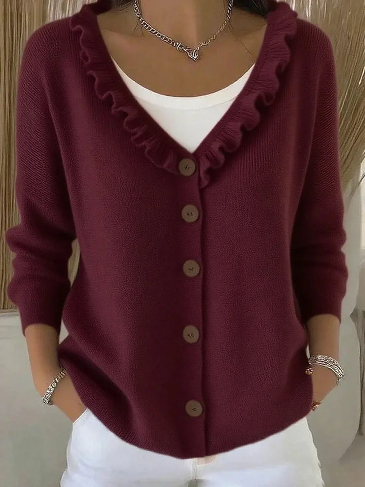 Burgundy ruffle V-neck button front cardigan close up