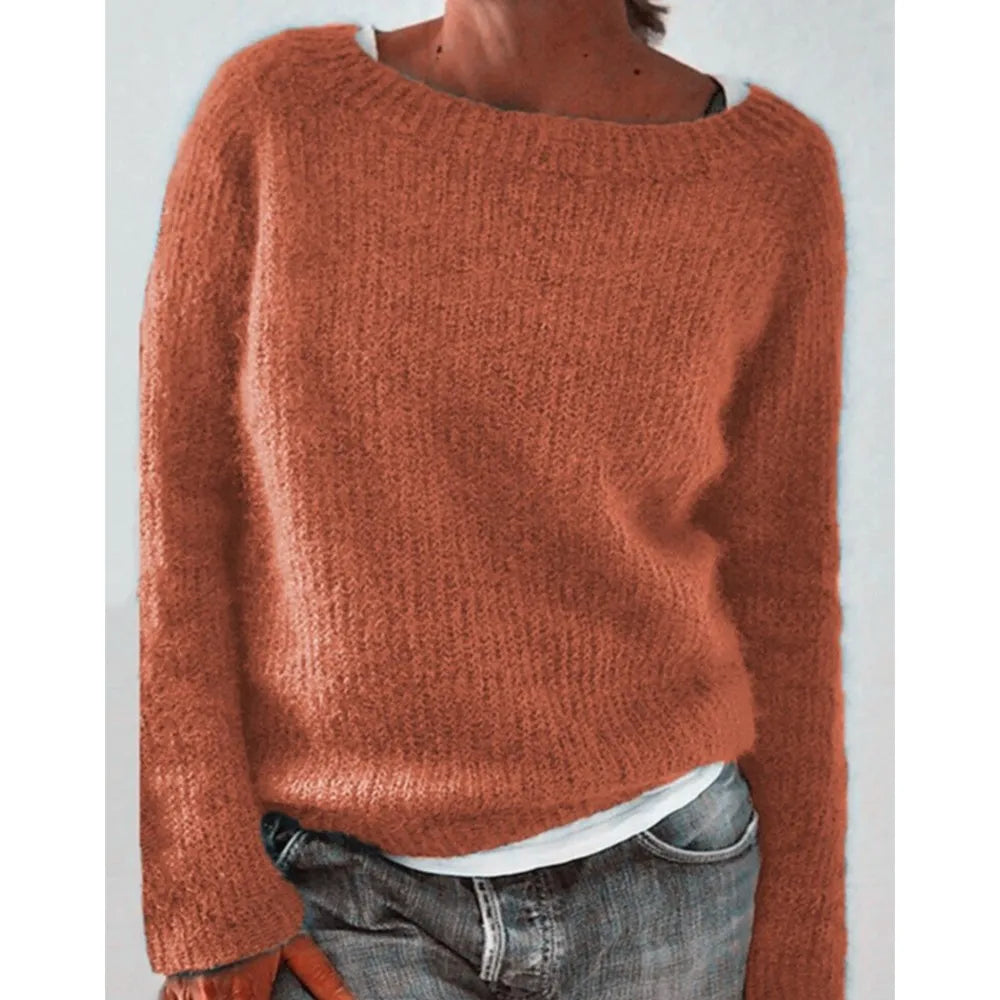 Woman wearing orange ribbed knit sweater