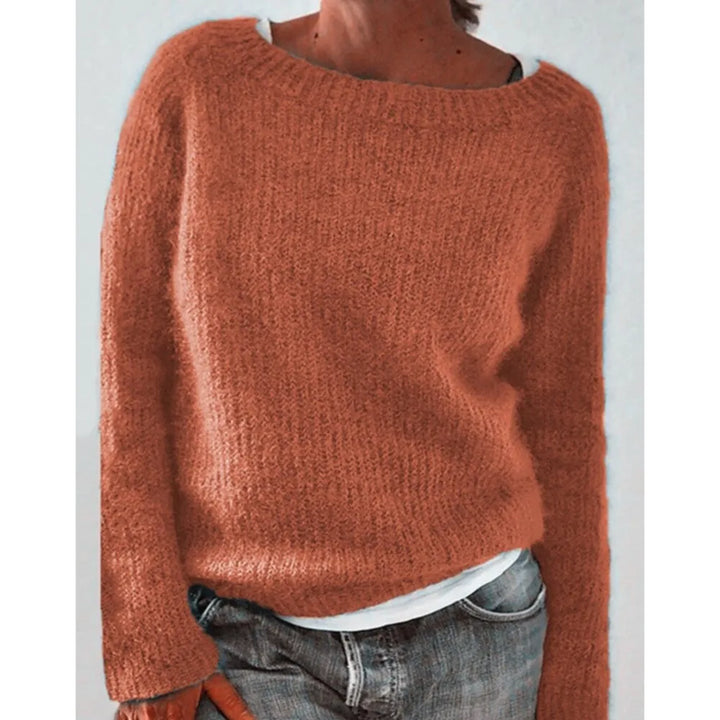Woman wearing orange ribbed knit sweater
