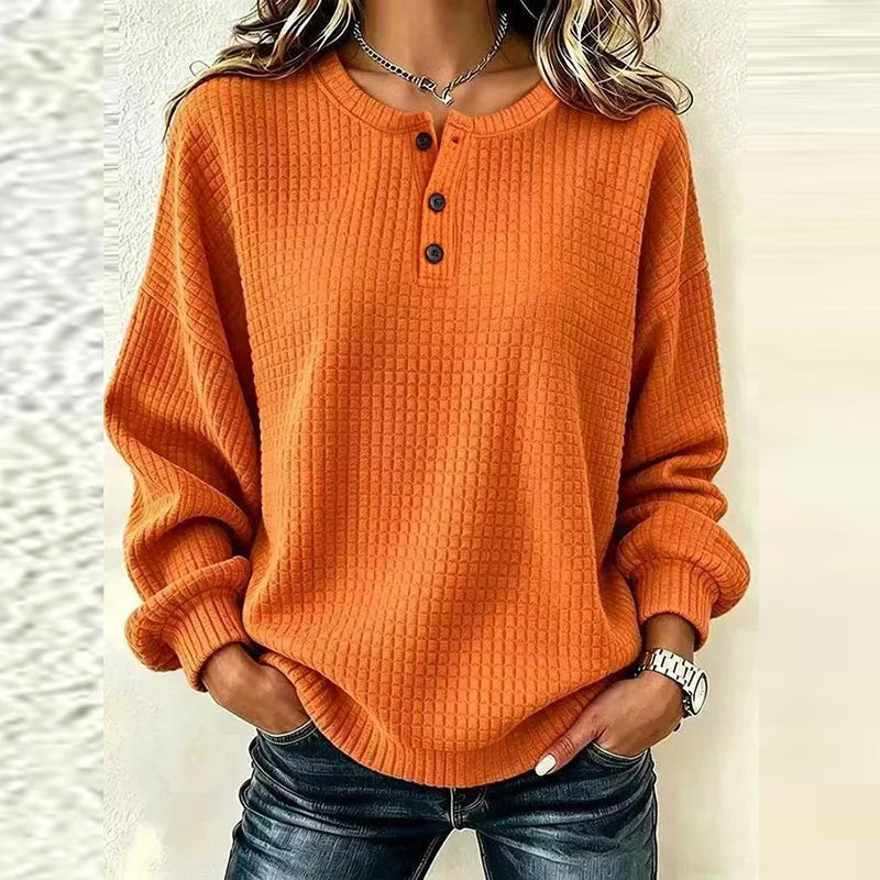 Orange waffle knit henley top with button placket