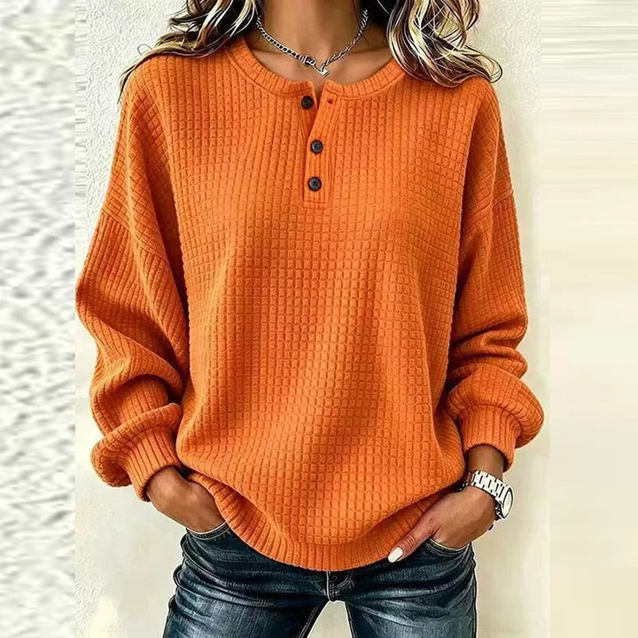 Orange waffle knit henley top with button placket