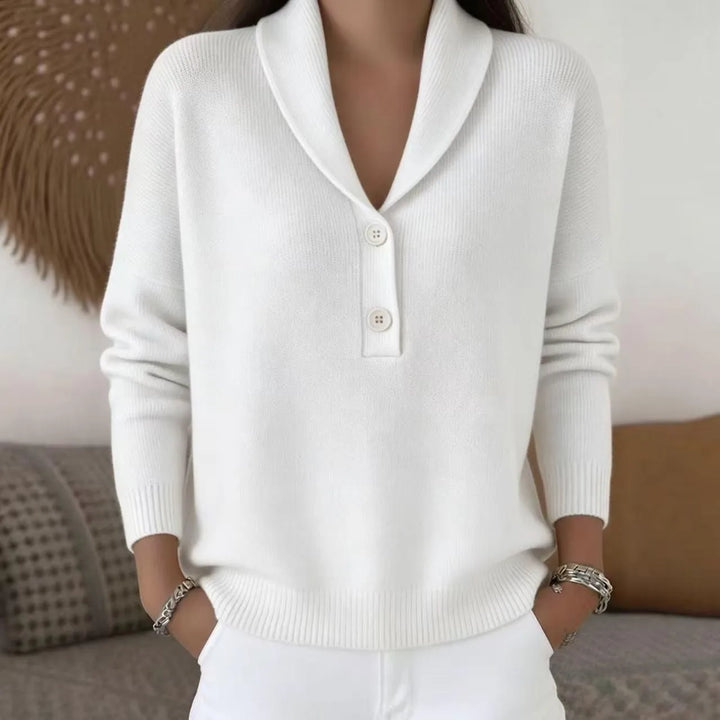 Woman wearing white shawl collar button sweater