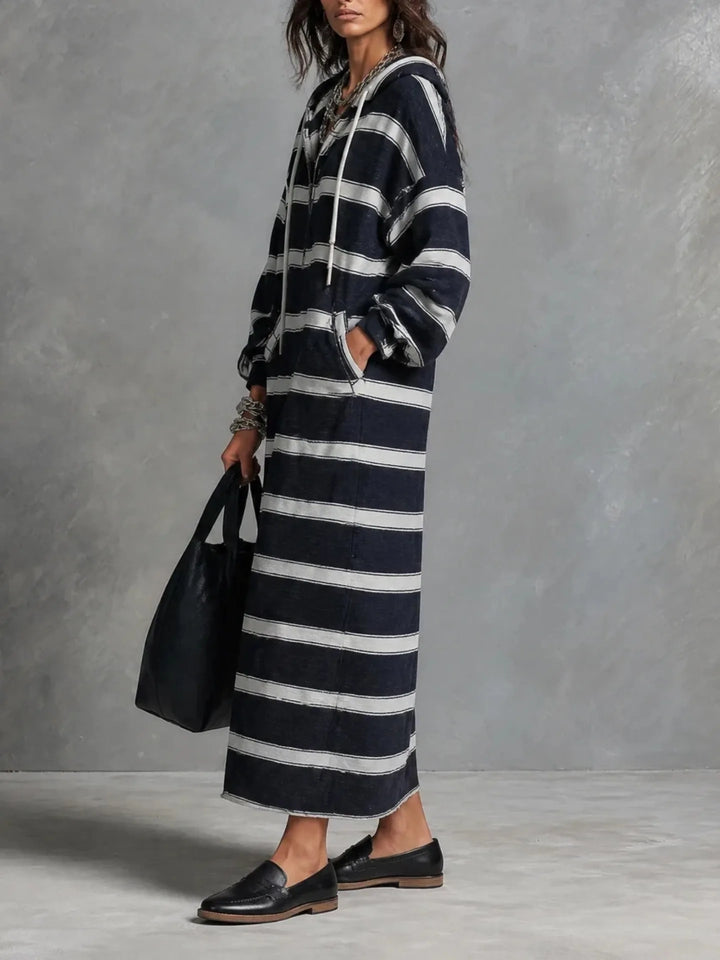 Side view of navy striped hoodie maxi dress with kangaroo pocket