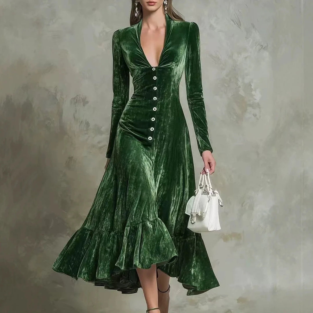 Woman in green velvet midi dress with jeweled buttons