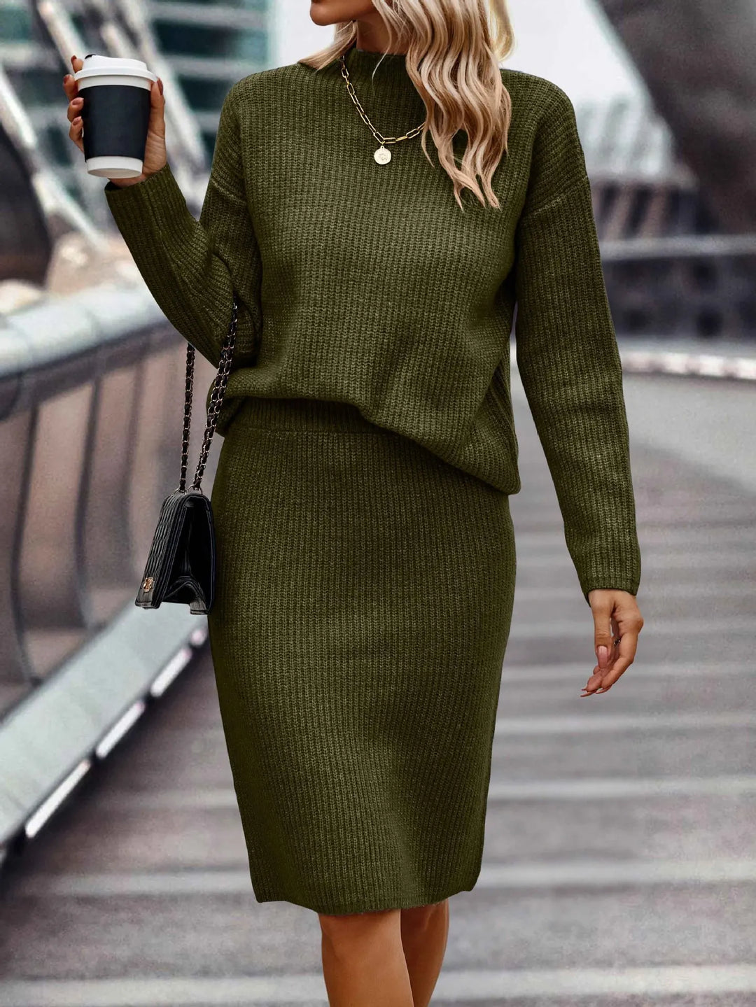 Close up of army green ribbed knit sweater and skirt set
