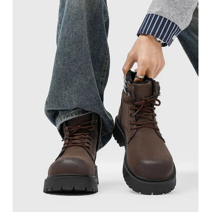 Man wearing brown lace-up boots with plush lining