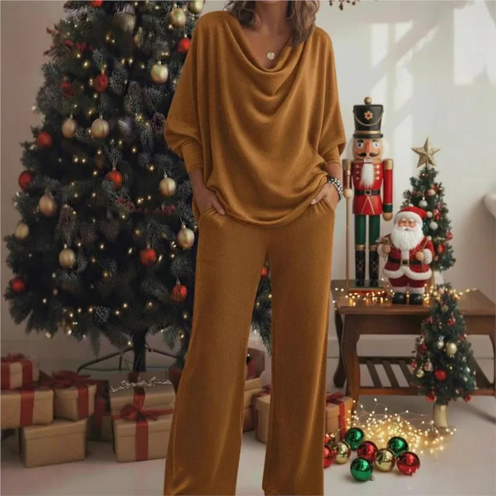 Woman wearing mustard yellow cowl neck knit top and wide leg pants set