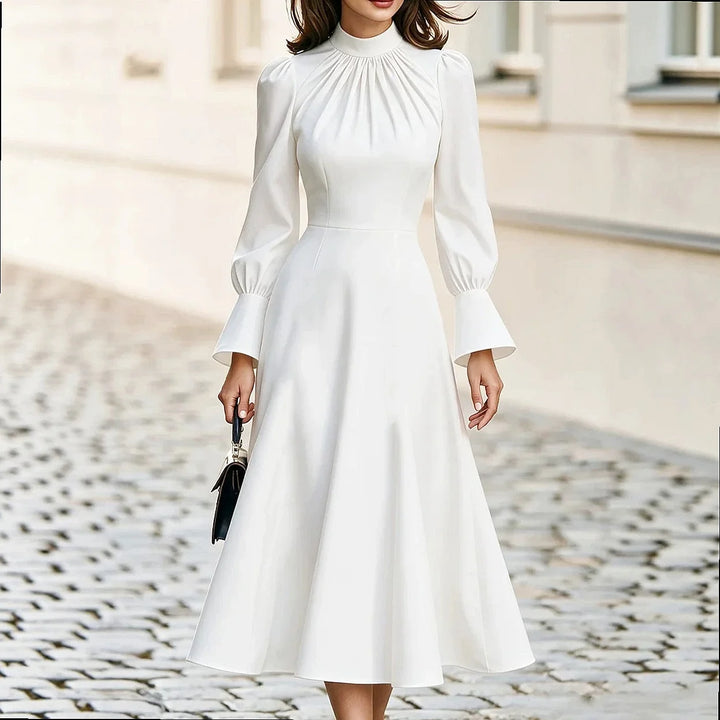 White mock neck midi dress with flared cuff sleeves, front view