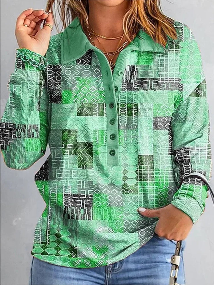Woman wearing green patchwork print button placket top