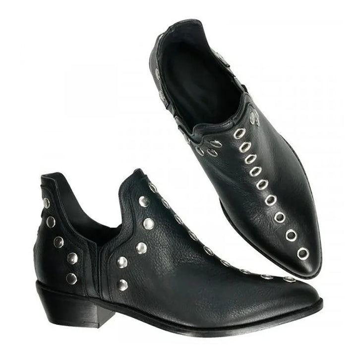 Pair of black leather grommet ankle boots side view