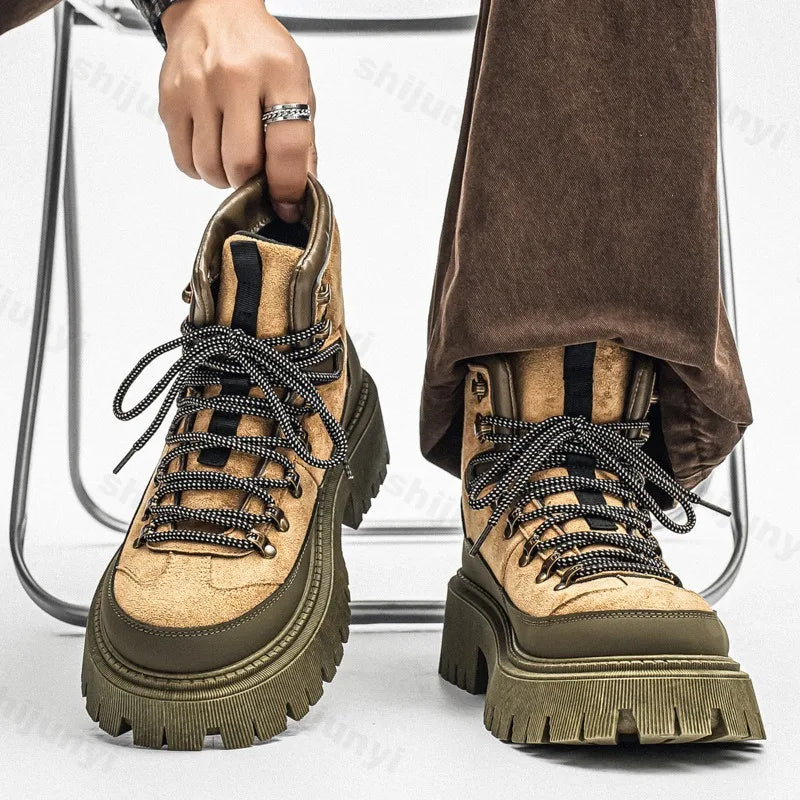 Man wearing army green platform hiking boots with lace-up front