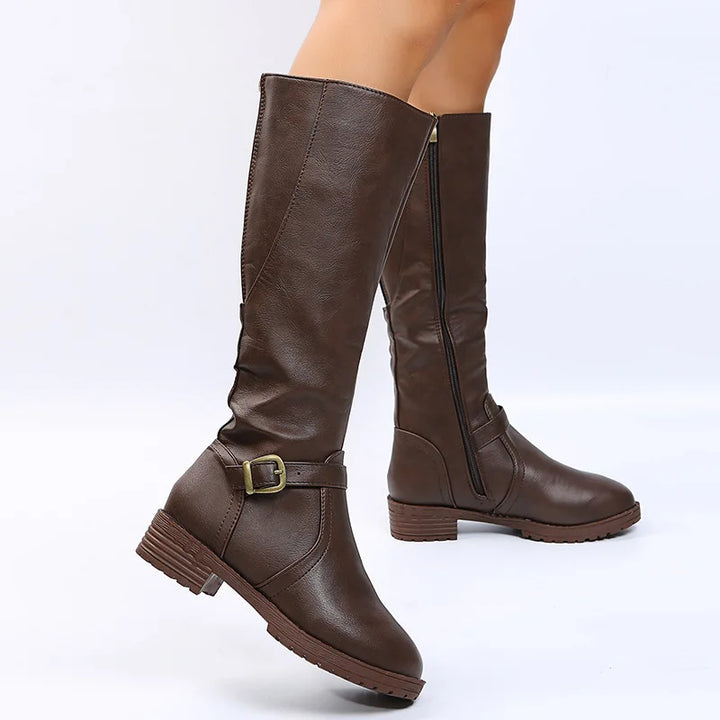 Dark brown knee-high boots side profile with buckle detail