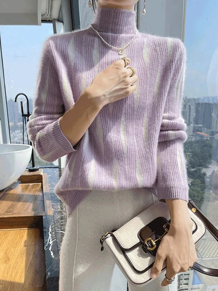 Purple striped mock neck sweater on model with bag