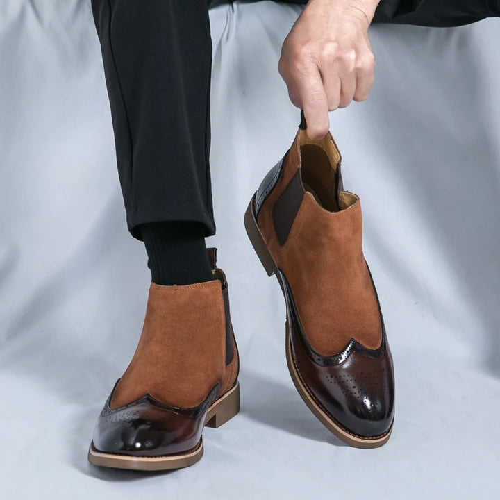 Man wearing brown two-tone Chelsea boots