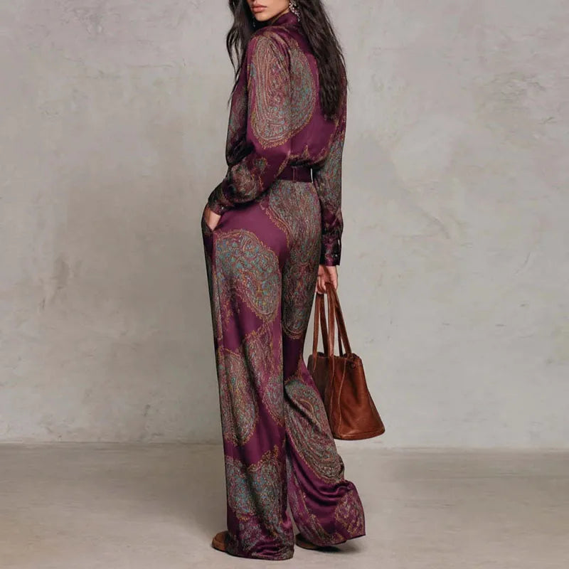 Back view of wine red paisley print two-piece shirt and pants set
