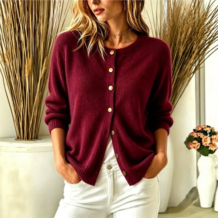 Woman wearing burgundy ribbed knit button-front cardigan, front view