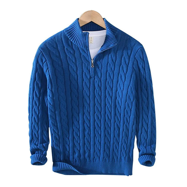 Blue cable knit quarter zip sweater on hanger