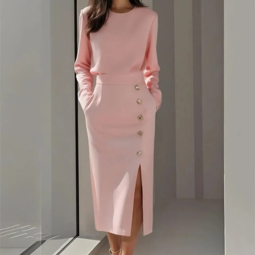 Pink long sleeve midi dress with button front detail and side slit, front view