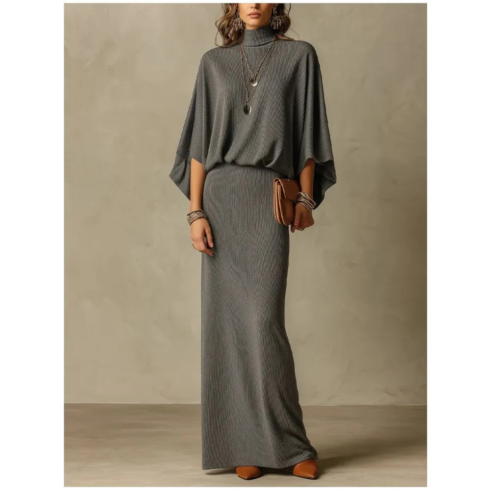 Woman wearing gray ribbed knit two piece skirt set with batwing sleeves