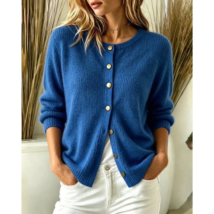Woman wearing blue ribbed knit button-front cardigan