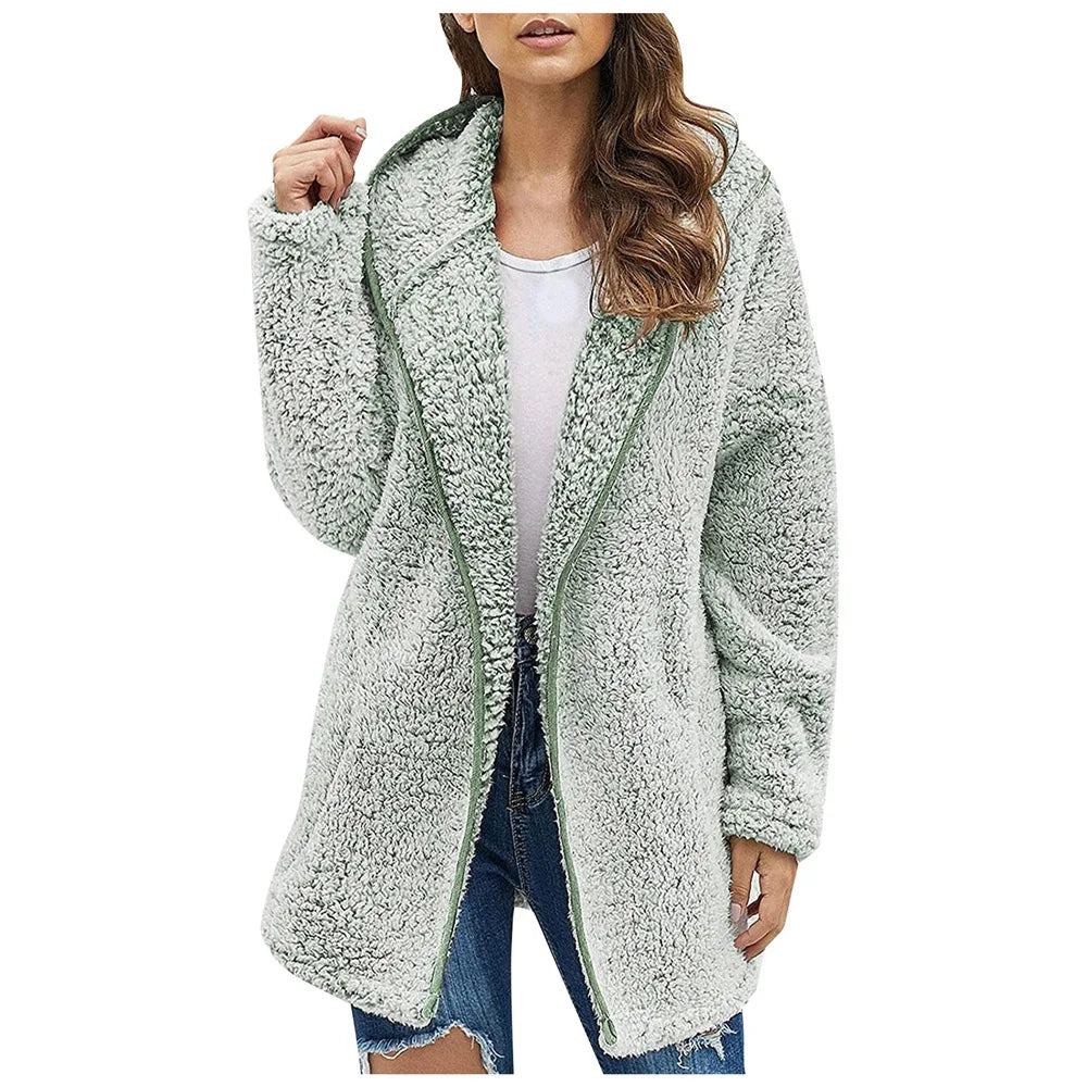 Woman wearing sage green brushed sherpa hooded jacket