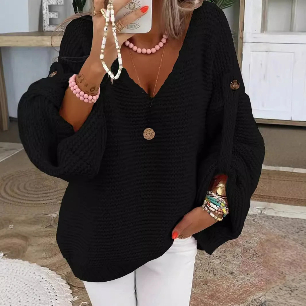 Black chunky knit V-neck sweater with lantern sleeves