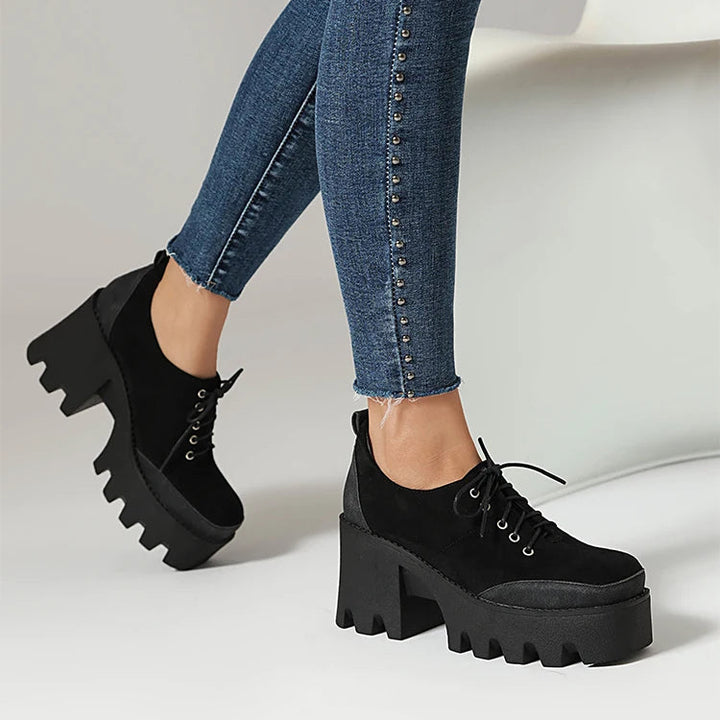 Black suede platform lace-up shoe angled view