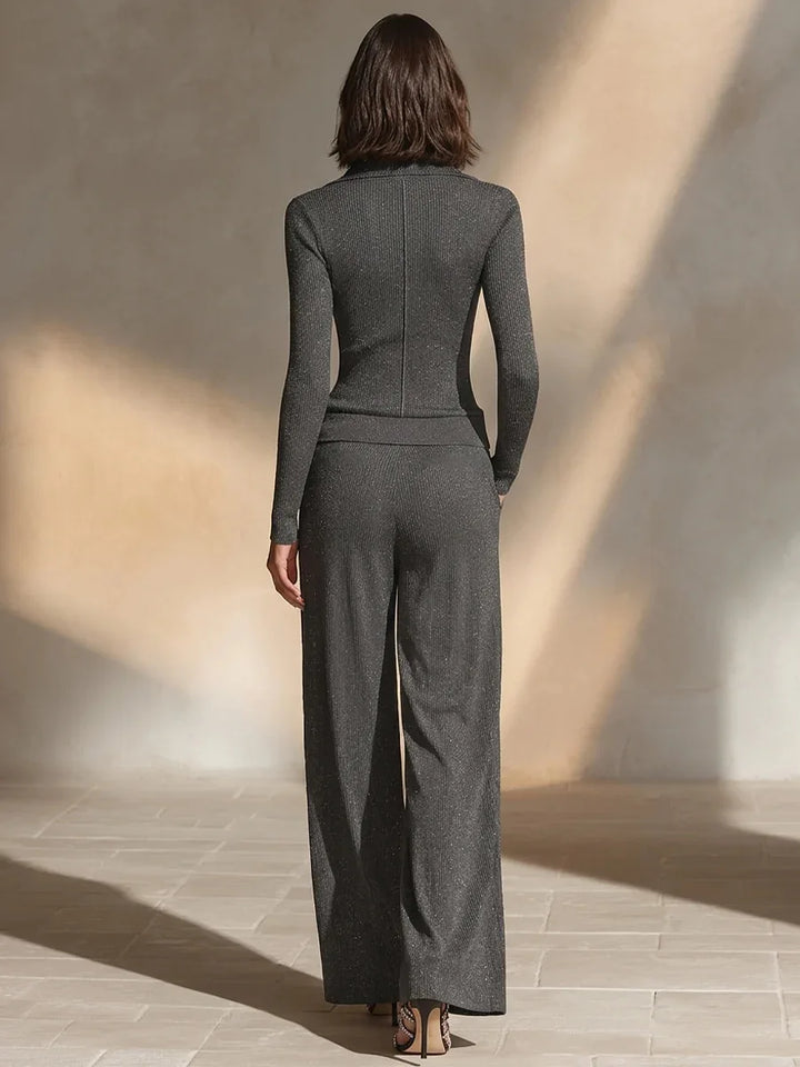 Back view of dark grey ribbed knit two piece set with wide leg pants