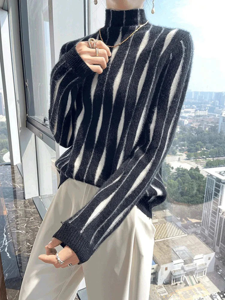 Black and white striped sweater with ribbed cuffs