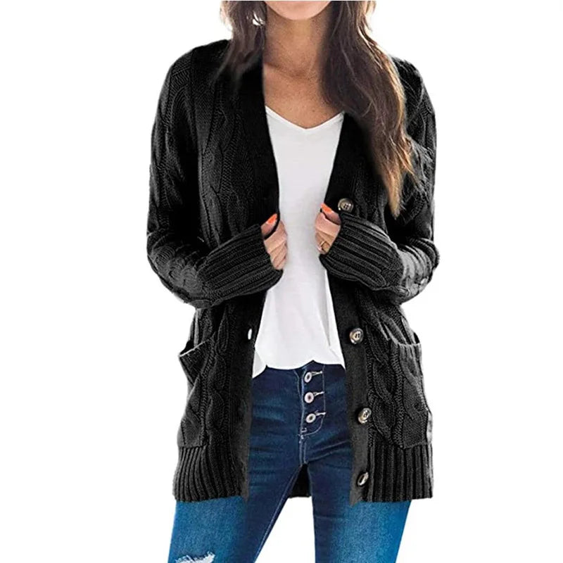 Woman wearing black cable knit cardigan