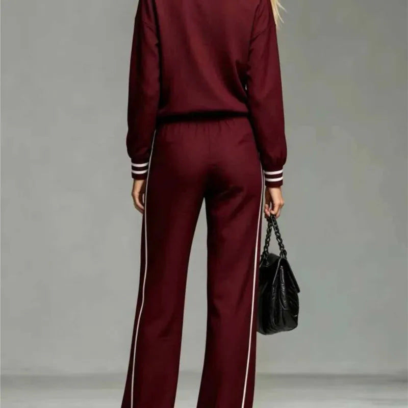 Back view of burgundy half-zip two piece pant set