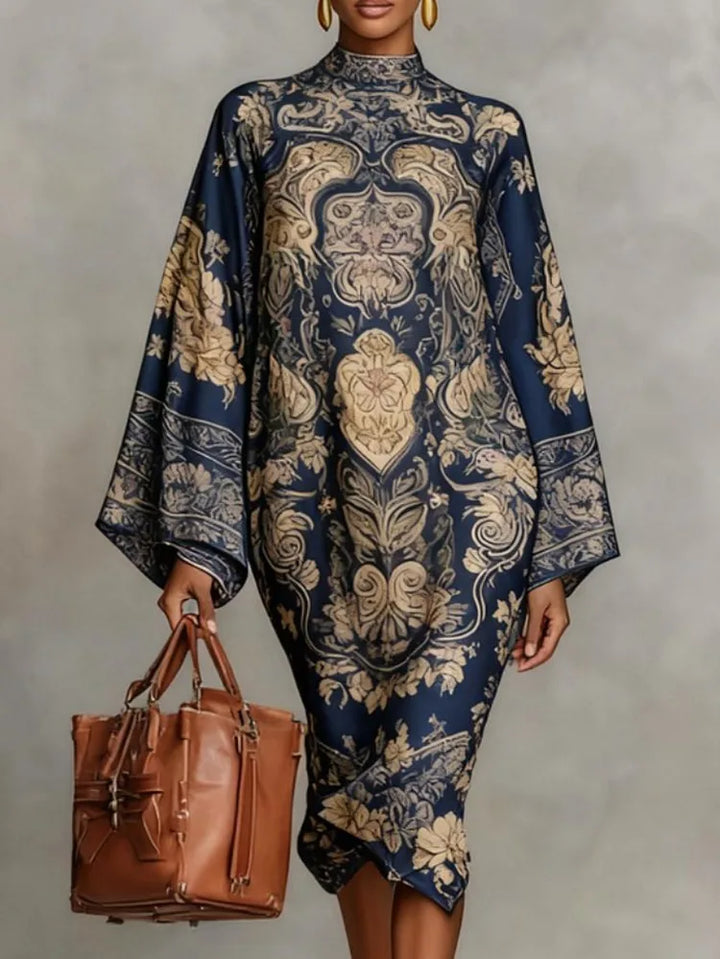 Woman wearing navy blue paisley print kaftan midi dress, front view