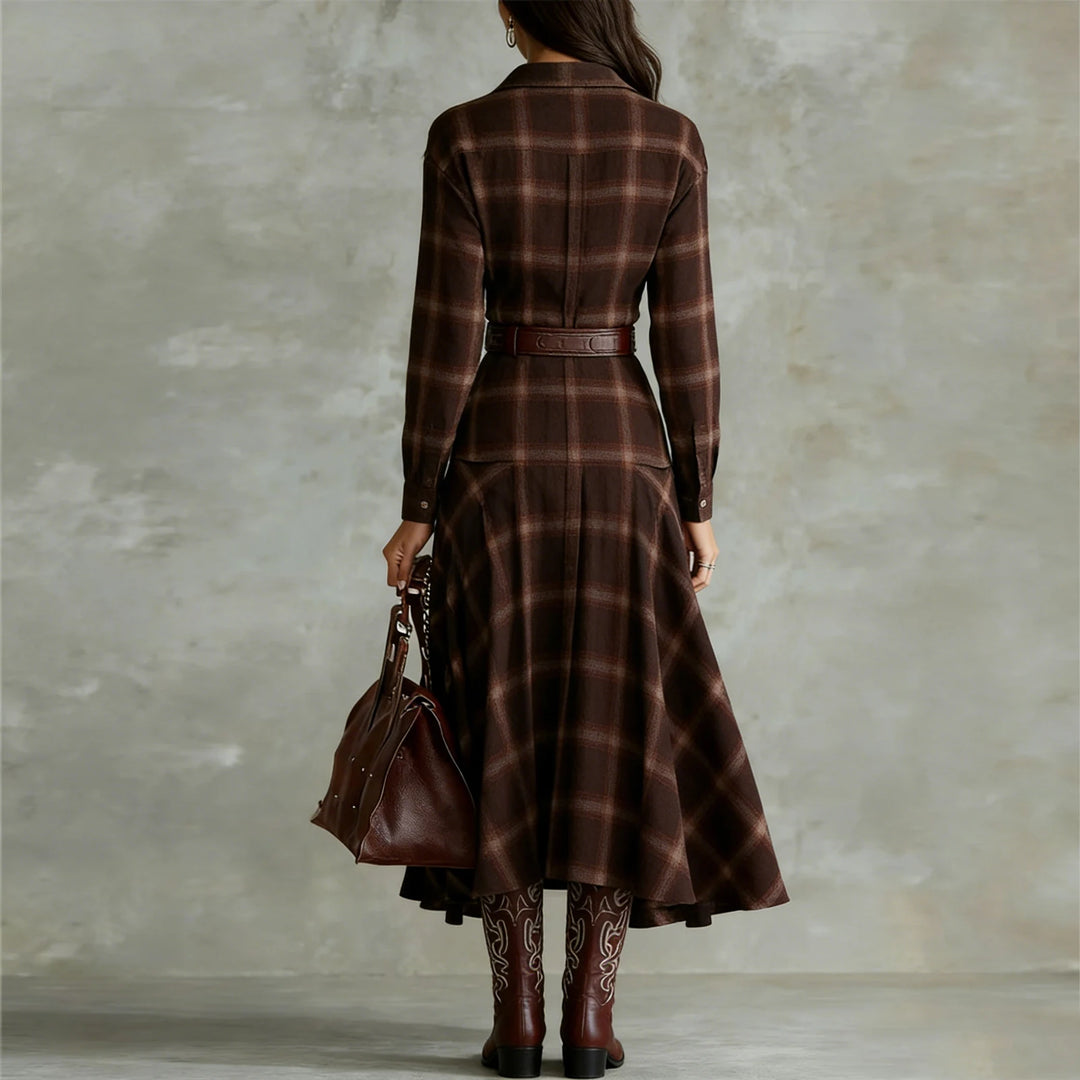 Back view of brown plaid shirt dress with belt and pleated skirt