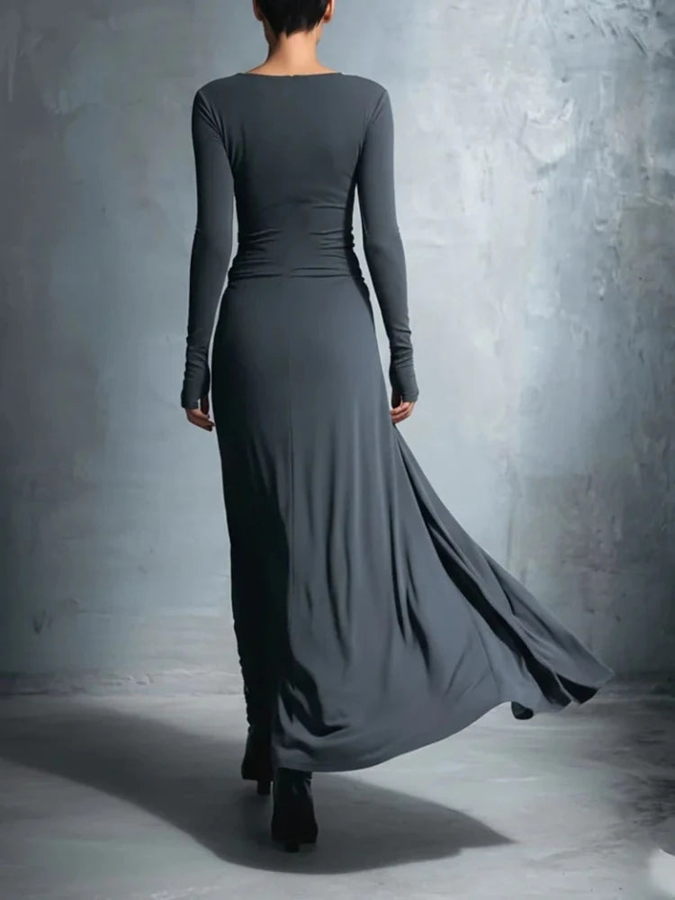 Dark grey maxi dress back view showing flowing skirt