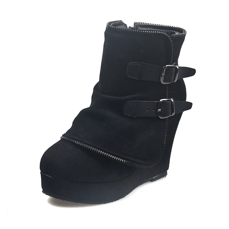Black suede wedge ankle boot on white background